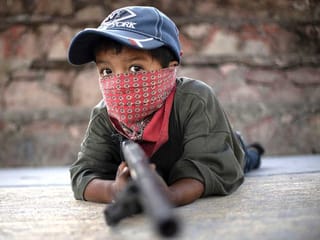 Mexican children take up arms in fight against drug gangs