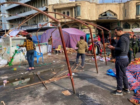 Followers of Shiite cleric Muqtada Al Sadr dismantle their tents in preparation for withdrawing from the anti-government protests in Tahrir Square in Baghdad.