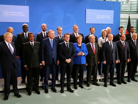 Britain's Prime Minister Boris Johnson, Republic of Congo's President Denis Sassou Nguesso, Turkish President Recep Tayyip Erdogan, French President Emmanuel Macron, German Chancellor Angela Merkel, United Nations Secretary-General Antonio Guterres, Russian President Vladimir Putin, Egyptian President Abdul Fattah Al Sissi, Algerian President Abdul Madjid Tebboune, US Secretary of State Mike Pompeo and European Commission President Ursula von der Leyen pose for a photo during the Libya summit in Berlin, Germany, on January 19, 2020. 