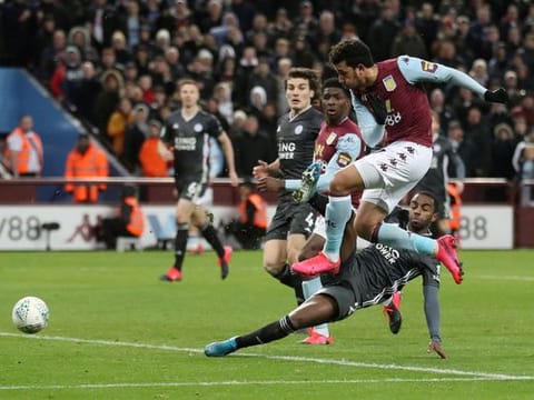 Aston Villa's Trezeguet scores their second goal against Leicester City in the League Cup. 