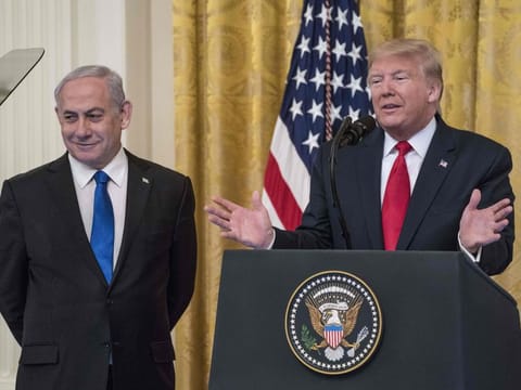 US President Donald Trump and Israeli Prime Minister Benjamin Netanyahu participate in a joint statement in the East Room of the White House in Washington, DC, on January 28, 2020. 