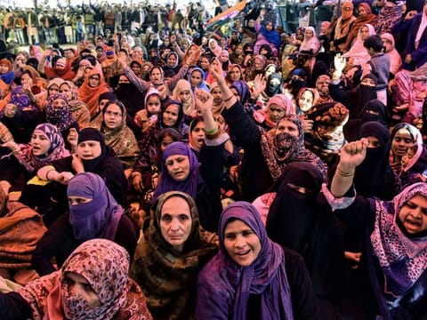 Women shout slogans against India's new citizenship law, during a protest at Shaheen Bagh area near the Jamia Millia Islamia University in New Delhi.