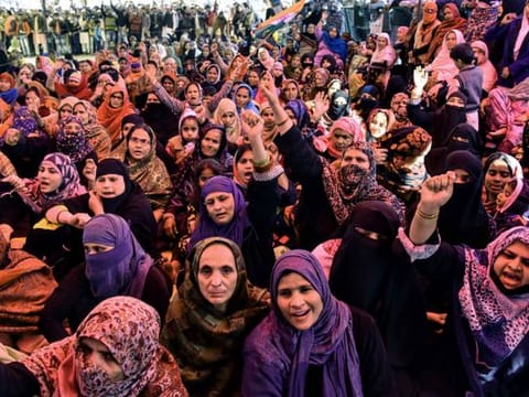 Women shout slogans against India's new citizenship law, during a protest at Shaheen Bagh area near the Jamia Millia Islamia University in New Delhi.