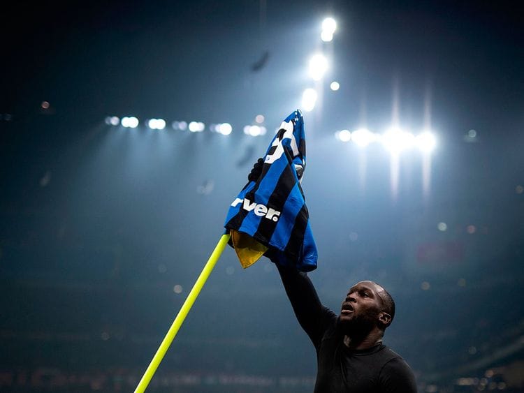 Inter Milan's forward Romelu Lukaku from Belgium  celebrates after scoring during  the Italian Serie A football match Inter Milan vs AC Milan on February 9, 2020 at the San Siro stadium in Milan. / AFP / MARCO BERTORELLO