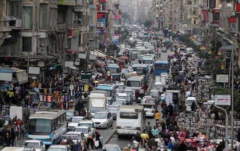 A general view shows a crowd and shops at Al Ataba, a market in central Cairo, Egypt February 10. Egypt's population has now reached 100 million and according to Aleksandar Bodiroza, representative of the UN, the pressure Egypt faces is acute. 
