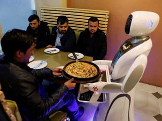 Multilingual robot waitress serves up fries in Afghan capital 