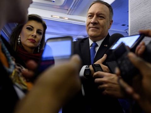 US Secretary of State Mike Pompeo speaks to reporters onboard his plane as he flies from Ethiopia to Saudi Arabia on February 19.