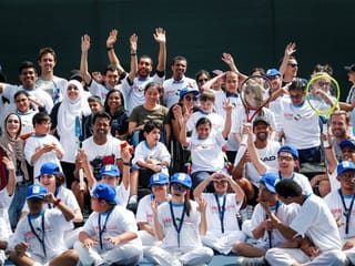 Leander Paes teaches tennis at the Dubai Duty Free Children of Determination Clinic 