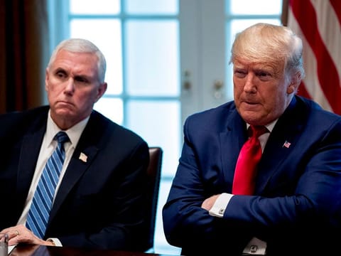 President Donald Trump and Vice President Mike Pence, left, attend a meeting with pharmaceutical executives on the coronavirus in the Cabinet Room of the White House, Monday, March 2, 2020, in Washington. 