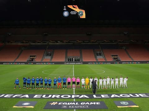 Inter Milan had to play their Europa League match against Ludogorets behind closed doors due to the coronavirusSiro, Milan, Italy - February 27, 2020    The teams line up before the match in an empty stadium after fans were not allowed in over coronavirus fears  Emilio Andreoli/Pool via Reuters