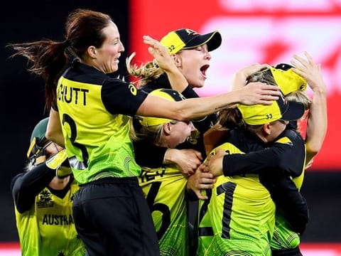 Australia's players celebrate after winning against India in the Twenty20 women's World Cup cricket final in Melbourne. 