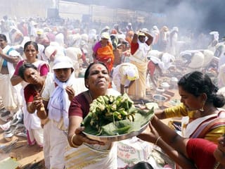 Photos: Thousands of women take part in Attukal Pongala in Kerala despite coronavirus fears