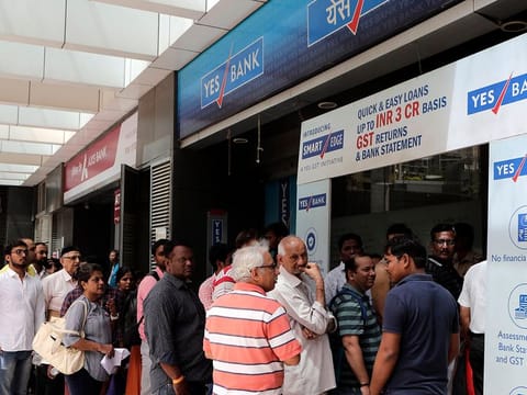 Scenes from a crisis moment in Yes Bank's history. The turnaround started with the Indian central bank stepping in and shoring up the bank's precarious financial position.