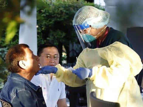 Philippine President Rodrigo Duterte undergoes testing for Covid-19 at the Malacanang Palace, Manila. Duterte is being tested for the new virus after meeting with Cabinet officials who were exposed to infected people.