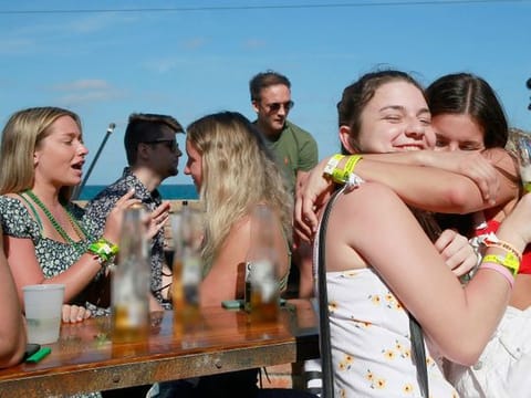 Photos: Spring breakers throng Florida beaches despite coronavirus pandemic