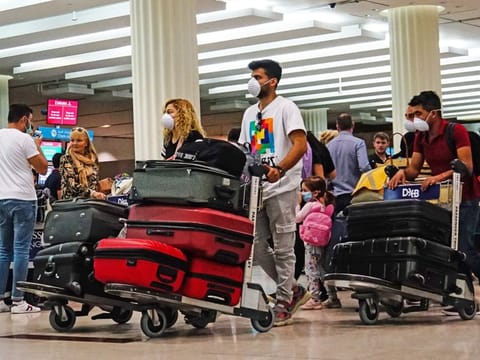 Passengers wearing face masks at Dubai airport on Monday 16 March 2020. 