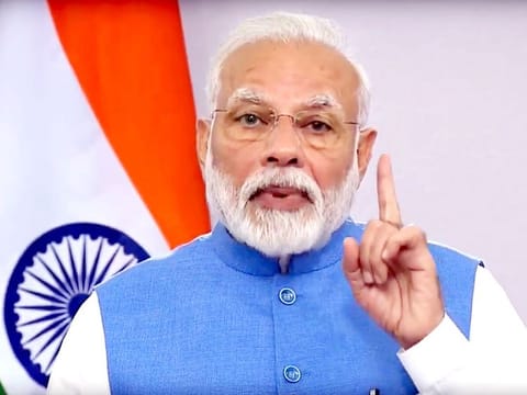 Prime Minister Narendra Modi addresses the Nation on coronavirus situation, in New Delhi on Thursday. 