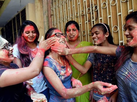 Girls celebrate after the hanging of Nirbhaya convicts, in Patna on Friday.