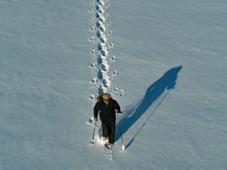 Artist walks 45,000 steps to create massive snow art