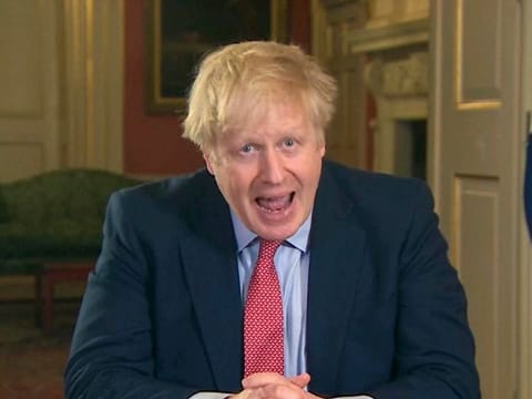 Britain's Prime Minister Boris Johnson addresses the nation from 10 Downing Street, in London, Monday March 23, 2020.