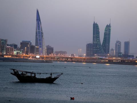 A general view of Bahrain's financial district in Manama. The instructions include exposing banknotes to ultraviolet germicidal irradiation, high temperatures or isolating them for at least three days.