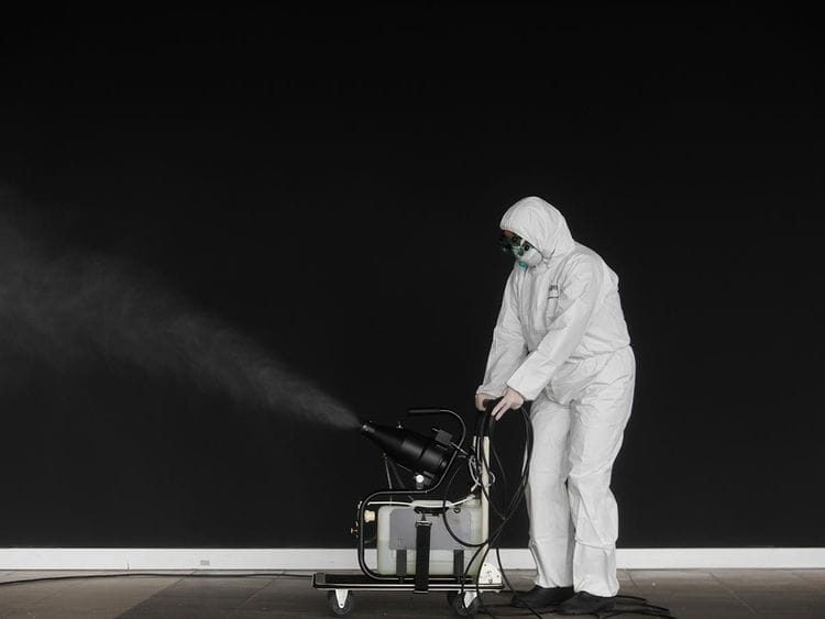 A municipal worker disinfect a warehouse with hospital material, to stop the spread of coronavirus disease (COVID-19) in Cascais, Portugal March 27, 2020.  