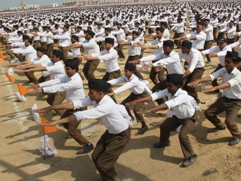 Meerut: RSS workers perform a drill during a rally organised by Rashtriya Swayamsevak Sangh, in Meerut on Sunday. PTI Photo (PTI2_25_2018_000166B)