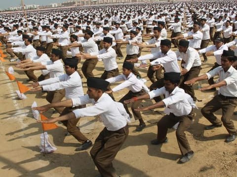 Meerut: RSS workers perform a drill during a rally organised by Rashtriya Swayamsevak Sangh, in Meerut on Sunday. PTI Photo (PTI2_25_2018_000166B)