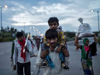 India’s migrant workers face long walk home amid COVID-19 lockdown