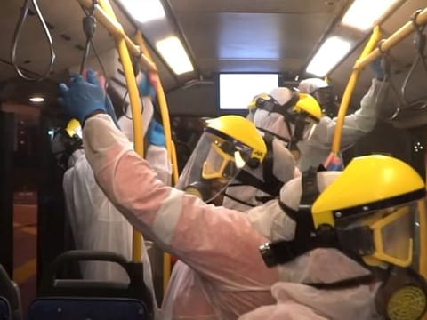 A public transport bus in Dubai being disinfected overnight during the National Sterilisation Drive to fight COVID-19 in the UAE.