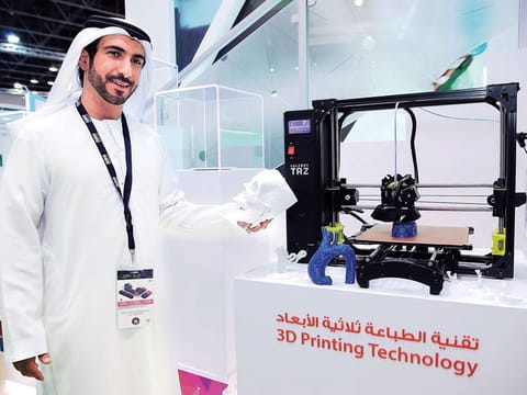 Dr Mohammad Al Redha, Director, Executive Office for Organisational Transformation, DHA, demos 3D printing 