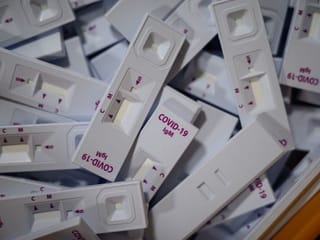 COVID-19 test kits pour off South Korean production line