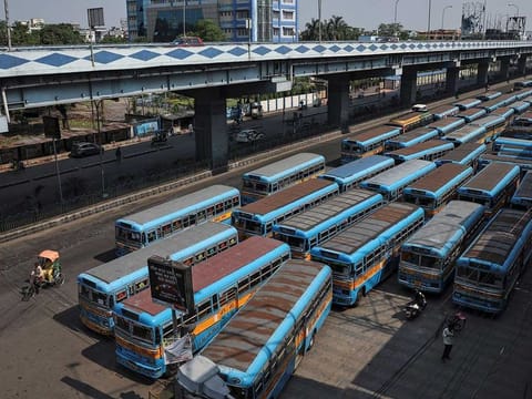Passenger buses are parked on a road during a 21-day nationwide lockdown to slow the spreading of the coronavirus disease (COVID-19), in Kolkata, India, April 2, 2020.