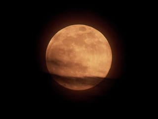 Largest supermoon of 2020 rises on a world battling COVID-19