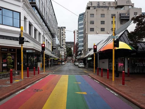 Closed shops stand on an empty street during a lockdown imposed due to the coronavirus in Wellington, New Zealand, on Thursday, April 2, 2020. 