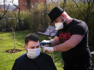 Kosovo's travelling barber keeps hair trimmed in COVID-19 lockdown