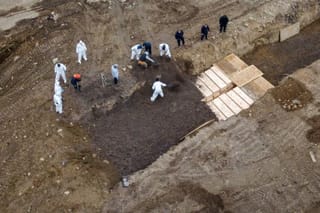 COVID-19: New mass graves being dug as New York's morgues are overwhelmed