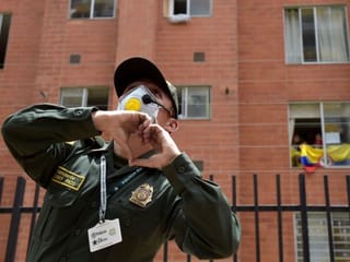 Colombian police dance with residents amid COVID-19 lockdown