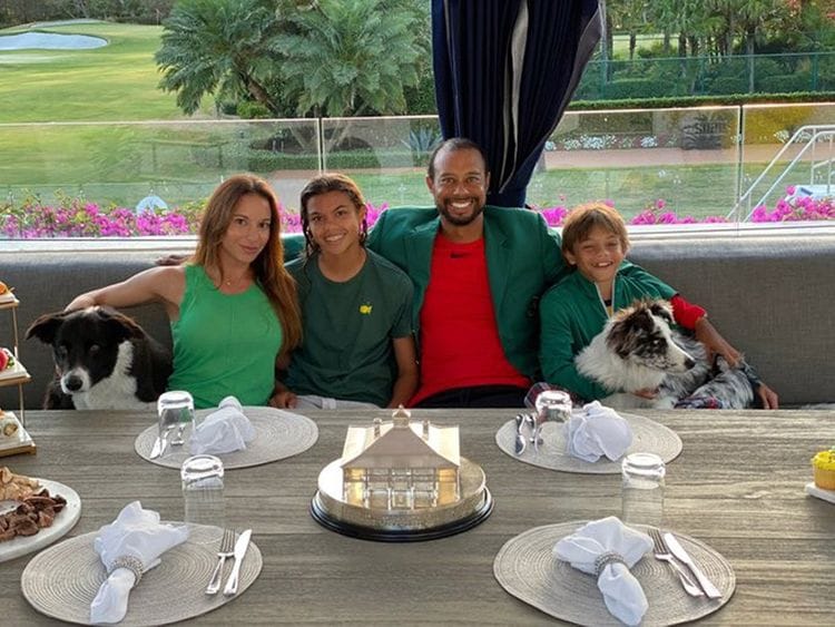 Tiger Woods with his son Charlie, daughter Sam Alexis and partner Erica Herman