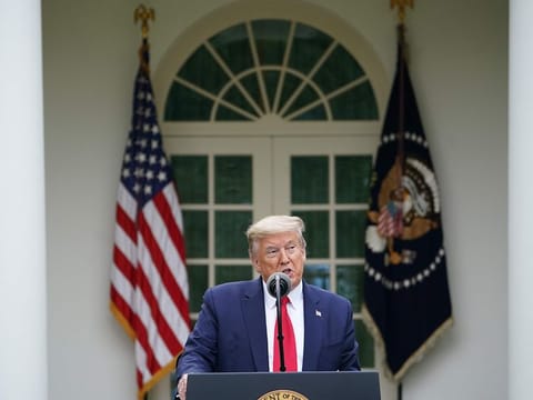 US President Donald Trump speaks during the daily briefing on the novel coronavirus, which causes COVID-19, in the Rose Garden of the White House on April 14, 2020, in Washington, DC. 