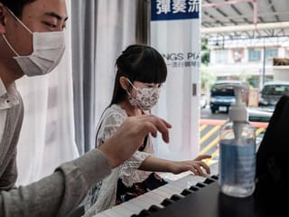 Piano van: Hong Kong music lessons go mobile to beat COVID-19