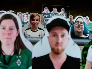 Cardboard cut-outs of fans fill football stadium in Germany