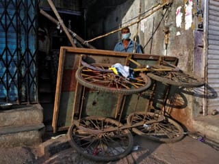 Indians build their own lockdown barricades in the country's slums