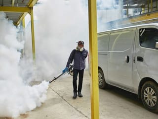 Singapore rushes to contain COVID-19 after record spike