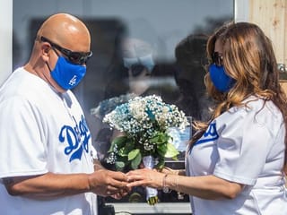 COVID-19: California couples get hitched in parking lot