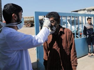 Photos: The world's displaced brace for coronavirus