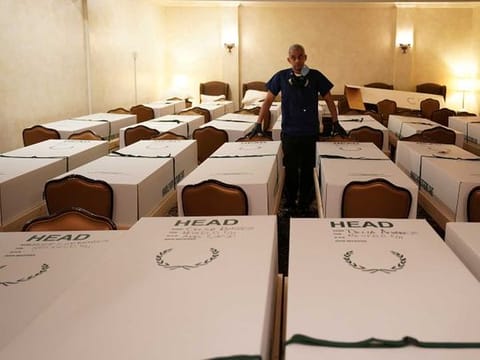 Caskets of bodies at the Gerard J. Neufeld funeral home during the outbreak of the coronavirus disease (COVID-19) in New York, US