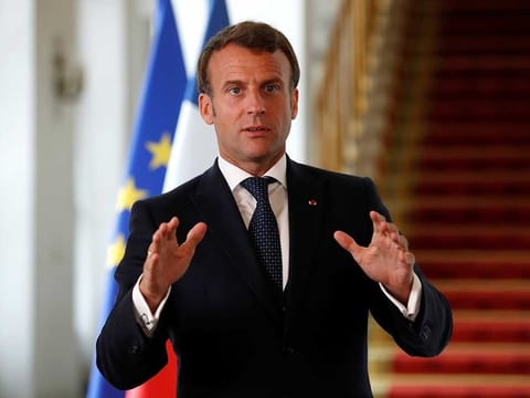 French President Emmanuel Macron speaks after a video-conference summit on vaccination at the Elysee Palace in Paris.