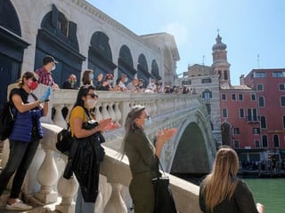 A masked world opens up as countries ease lockdown