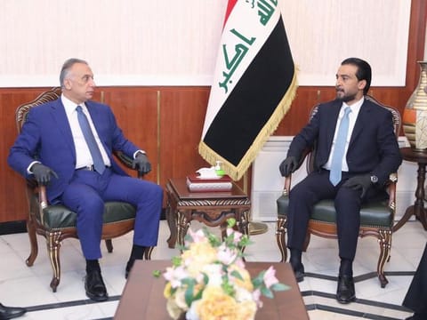 Iraqi Prime Minister Mustapha Al Kadhimi (L) before the vote on the new government at the parliament headquarters in Baghdad, Iraq